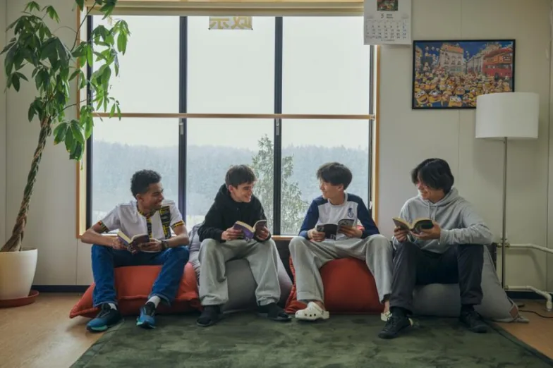 Students reading together in the common room